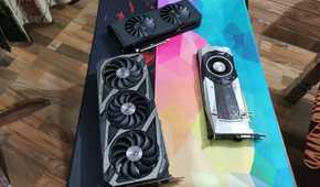 An Intel Arc A750 placed next to an ASUS Rog Strix RTX 3080 Ti and a GTX 1080 Ti