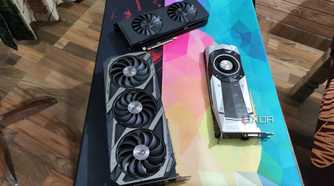 An Intel Arc A750 placed next to an ASUS Rog Strix RTX 3080 Ti and a GTX 1080 Ti