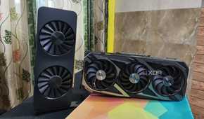 An Intel Arc A750 placed next to an ASUS Rog Strix RTX 3080 Ti