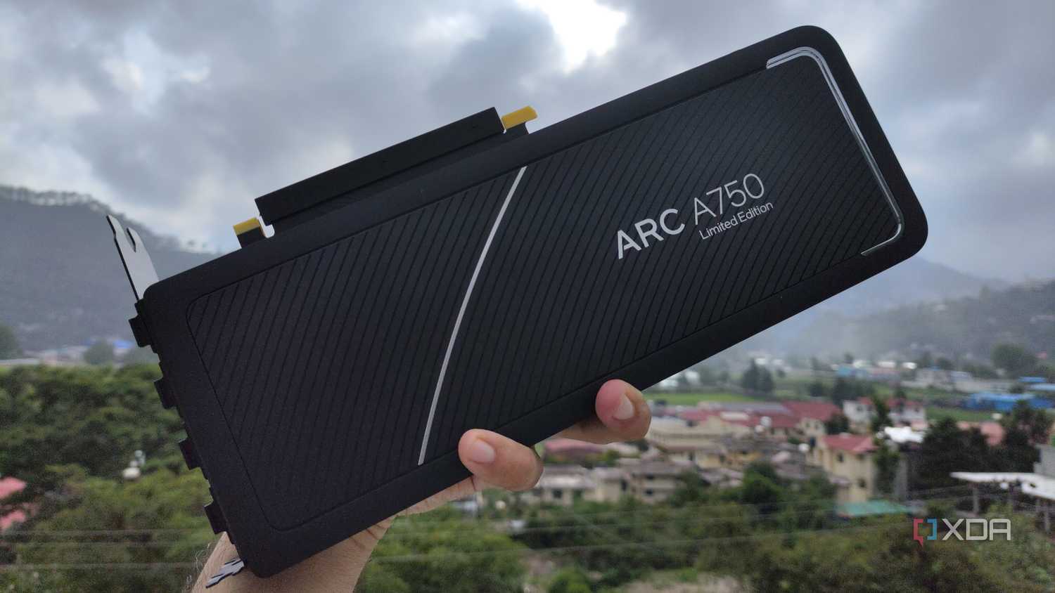 A person holding an Intel Arc A750