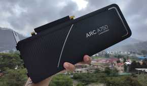A person holding an Intel Arc A750