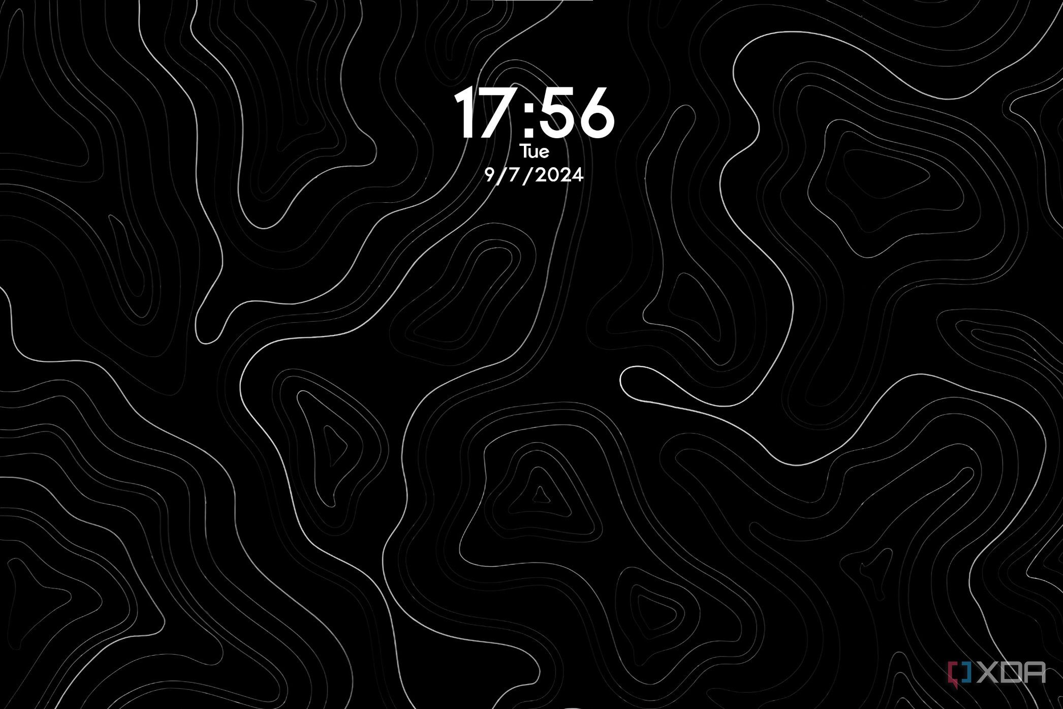 A wallpaper with white curvy lines and the date and time displayed