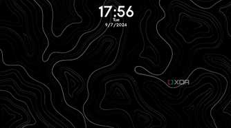 A wallpaper with white curvy lines and the date and time displayed