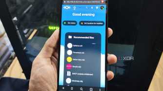 The Nextcloud UI displayed on a Poco M6 Pro, with a PC in the background