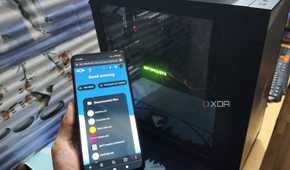 The Nextcloud UI displayed on a Poco M6 Pro, with a PC in the background