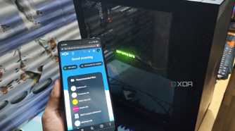 The Nextcloud UI displayed on a Poco M6 Pro, with a PC in the background