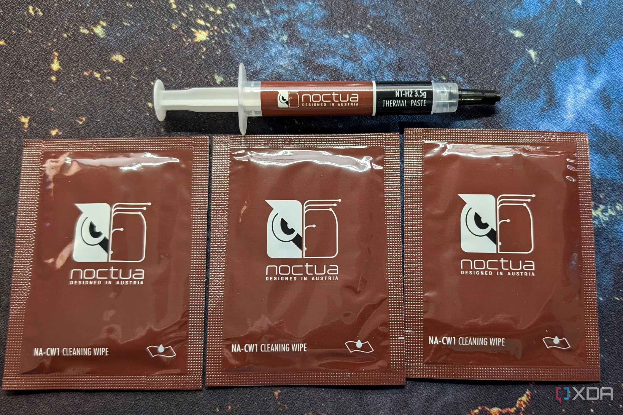 image of noctua nt-h2 thermal paste with cleaning wipes