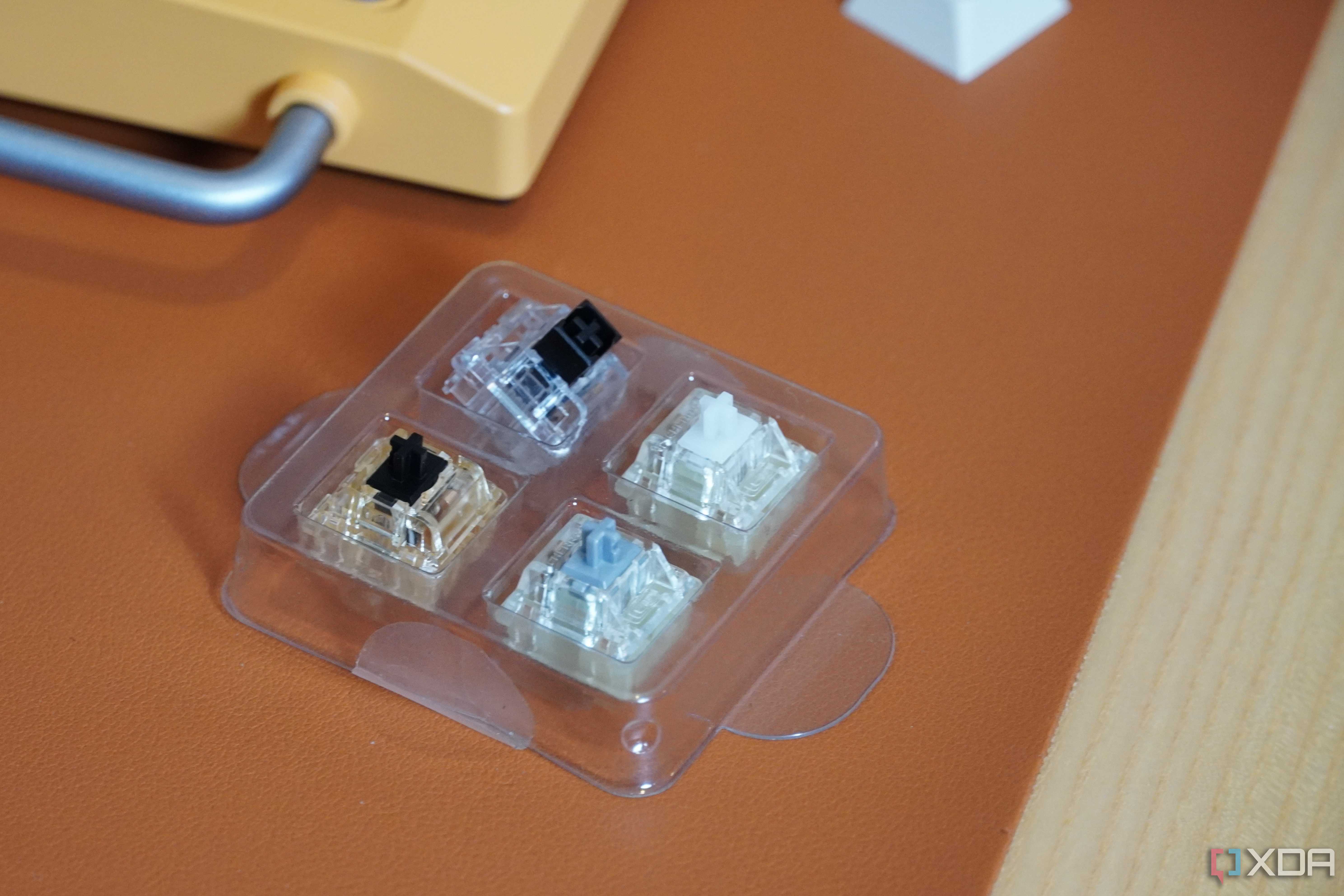 The extra NuPhy Field75 switches.