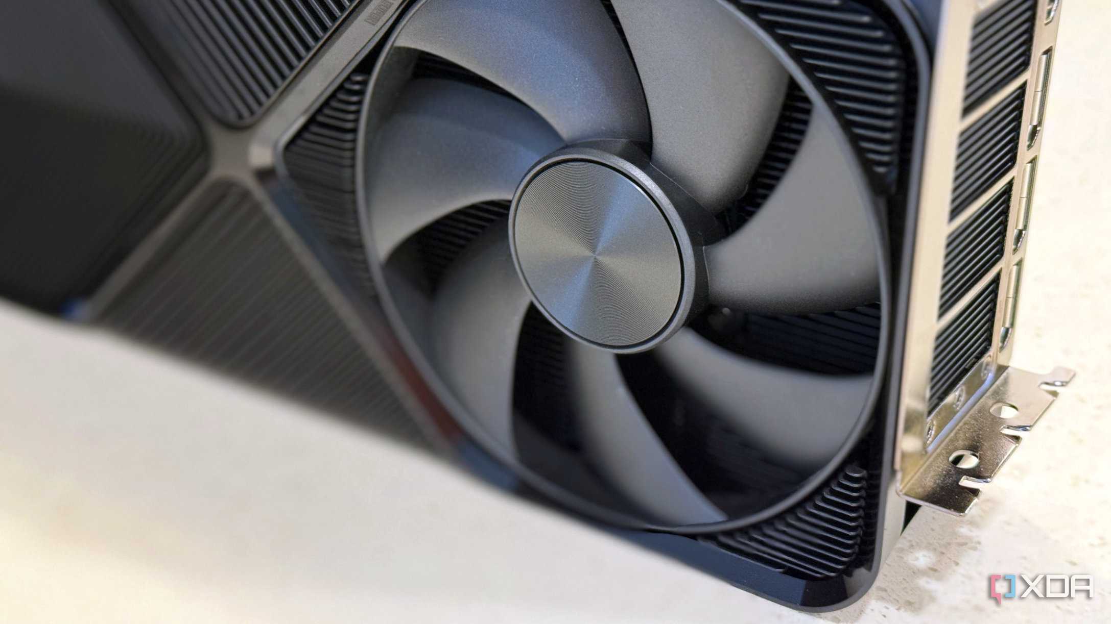 closeup of the fan on an nvidia geforce rtx 4080 super fe graphics card