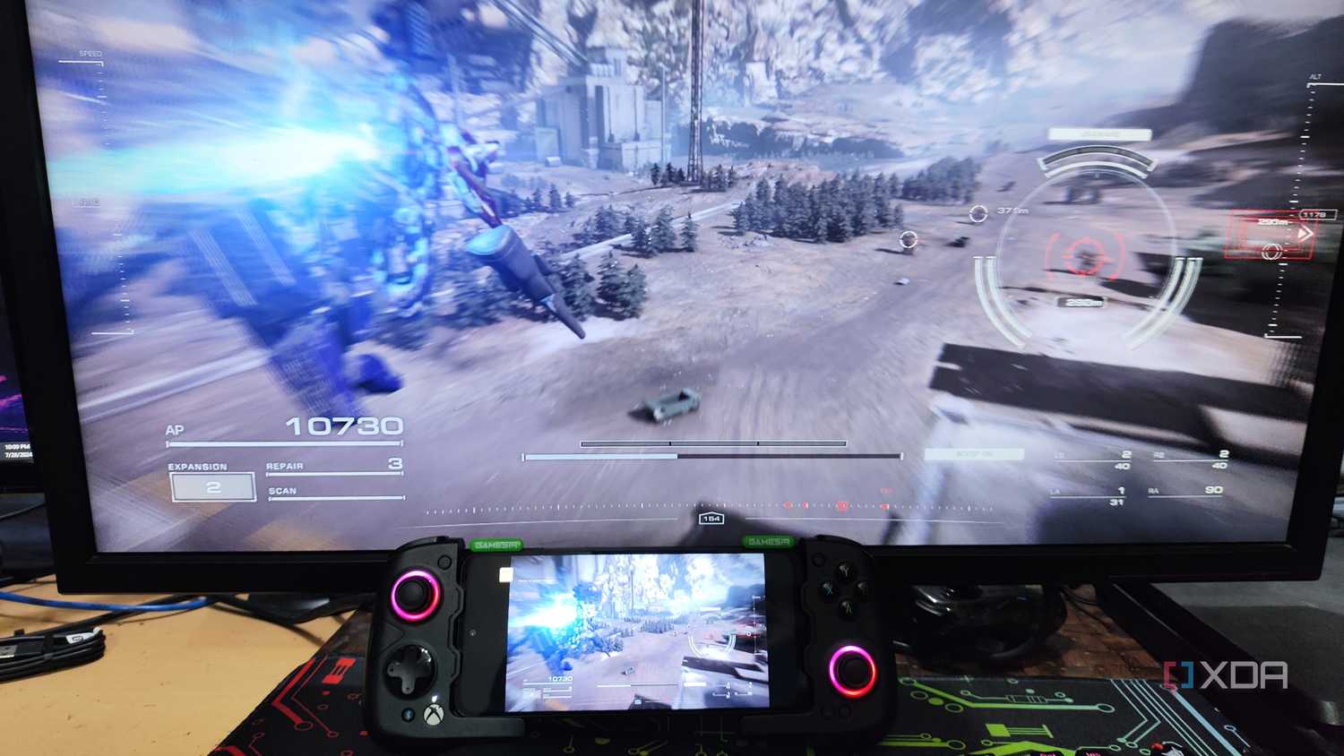Armored Core VI being streamed to a Poco M6 Pro via Parsec, with the phone attached to a GameSir Aileron X4