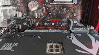 Close up of an Asus Prime B350 motherboard with a GPU installed on it