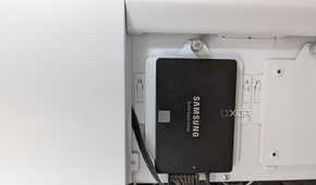 Samsung 860 EVO 250GB SSD in black installed on a white case
