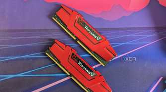 Two red sticks of G.Skill Ripjaws DDR4 RAM on a desk mat