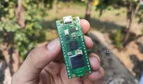 A person holding a Raspberry Pi Pico