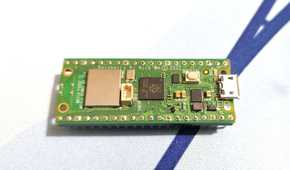 A Raspberry Pi Pico placed on a mousepad