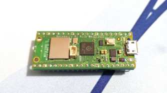 A Raspberry Pi Pico placed on a mousepad