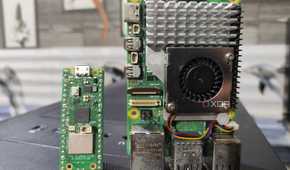 A Raspberry Pi Pico placed next to a Raspberry Pi 5