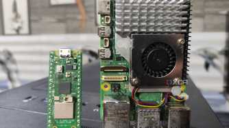 A Raspberry Pi Pico placed next to a Raspberry Pi 5