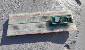 Plugging a Raspberry Pi Pico into a breadboard