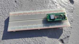 Plugging a Raspberry Pi Pico into a breadboard