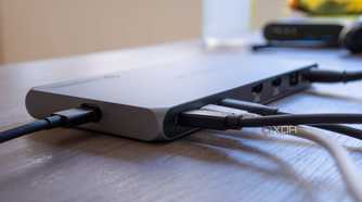 Close-up of the three Thunderbolt ports on the Satechi Thunderbolt 4 Multi-Display Docking Station, each with a peripheral plugged in