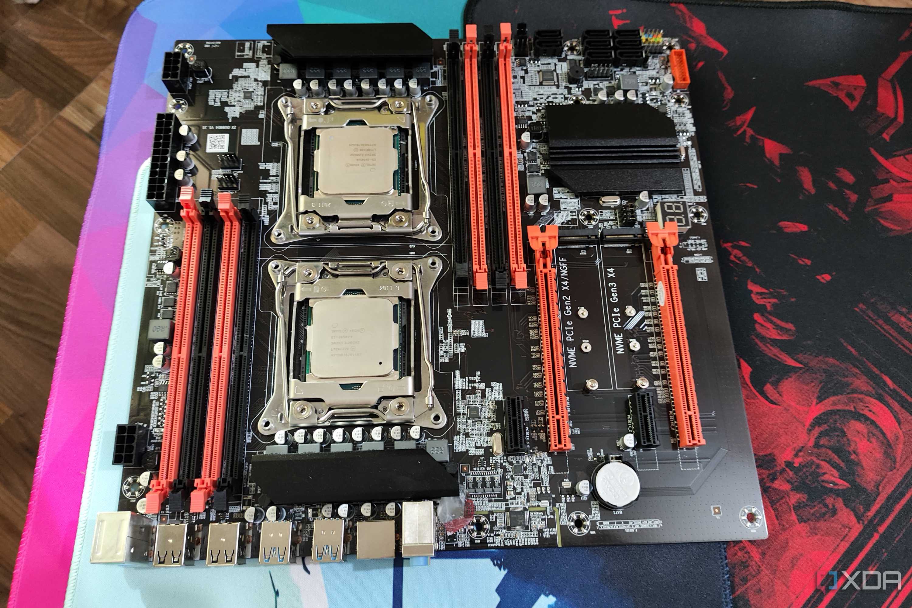 An X99 server motherboard with two Intel Xeon CPUs slotted in