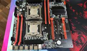 An X99 server motherboard with two Intel Xeon CPUs slotted in
