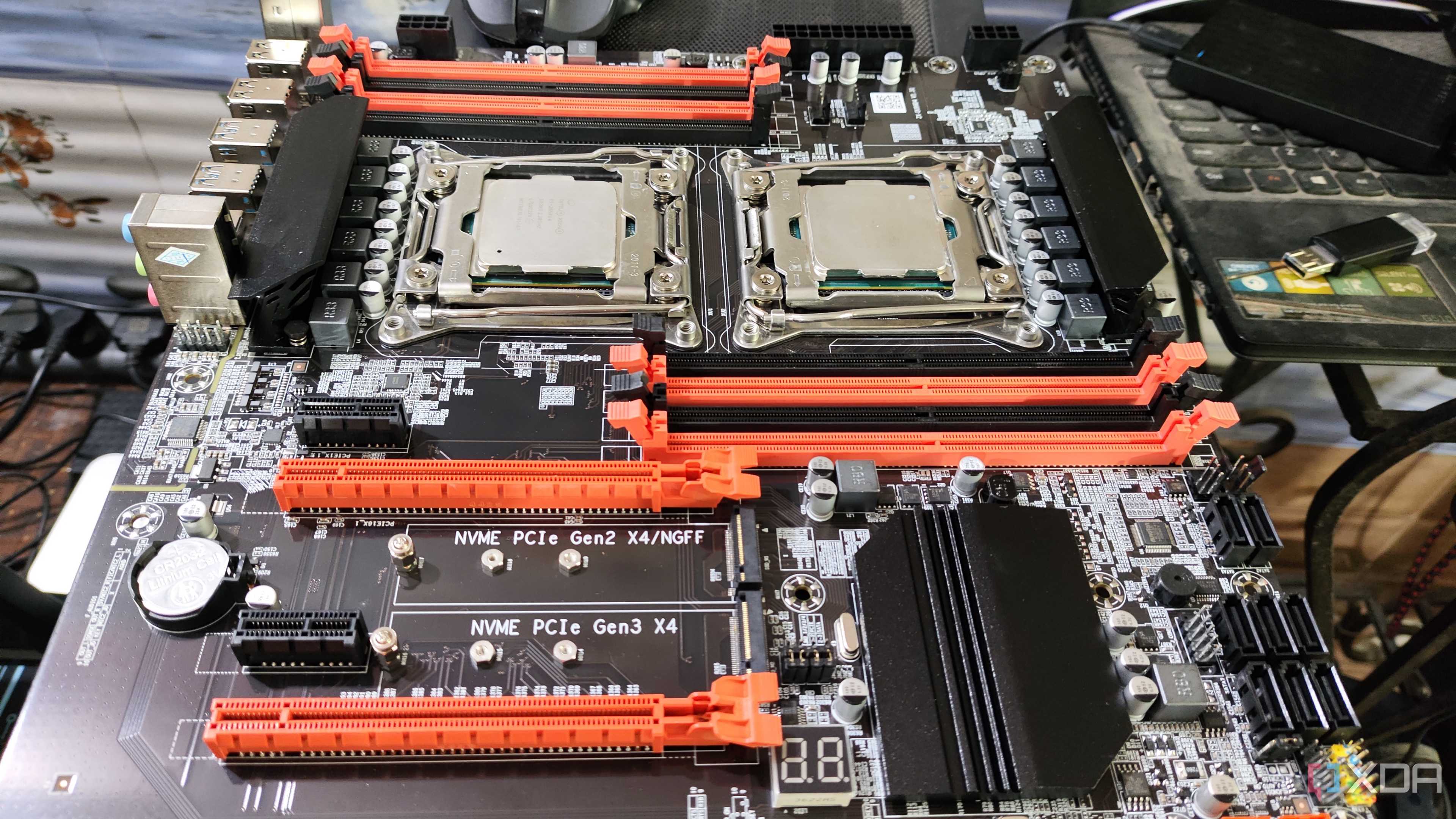 An X99 server motherboard resting on top of a PC