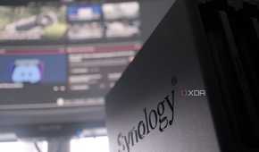 Synology NAS against a monitor on a desk