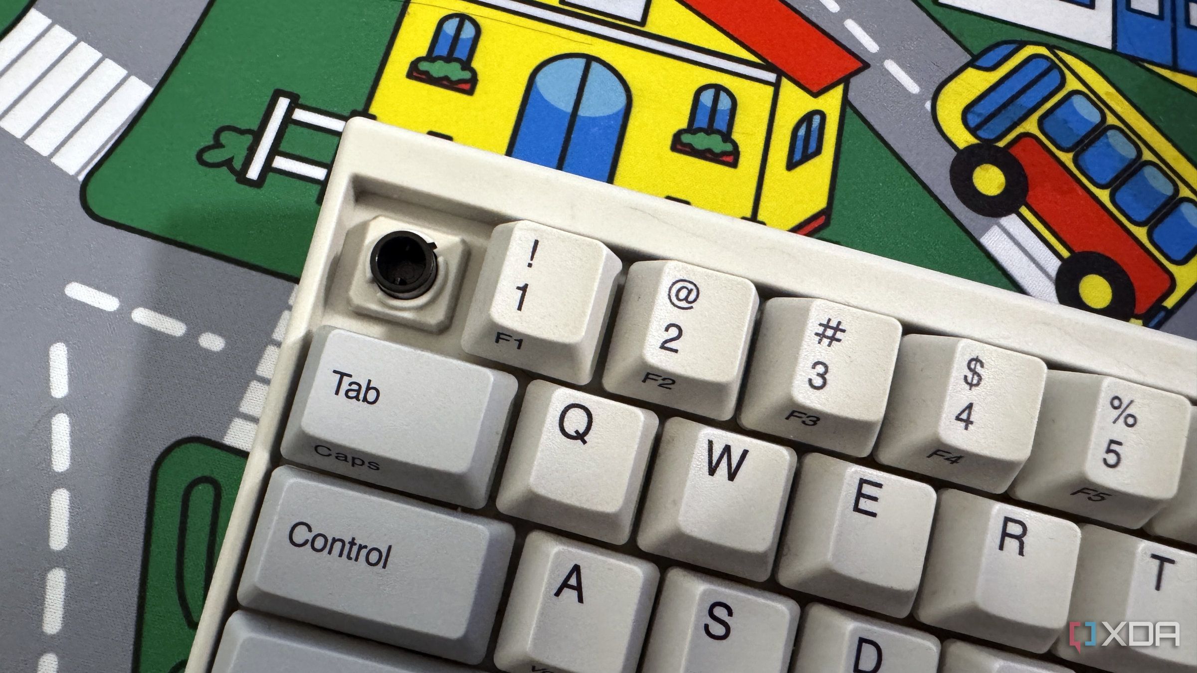 closeup of hhkb pro 2 keyboard showing esc key removed