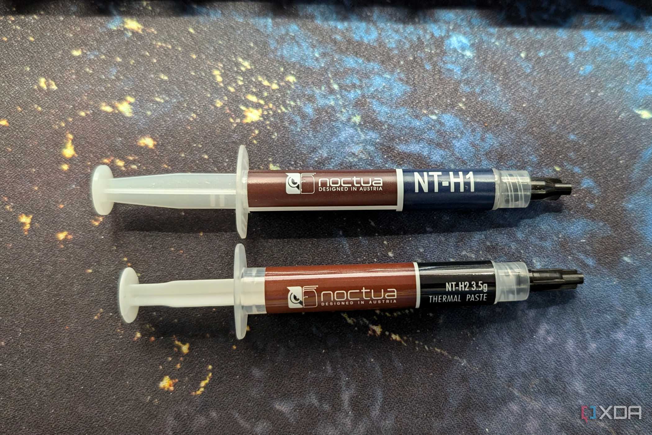 images of tubes of noctua nt-h1 and nt-h2 thermal paste