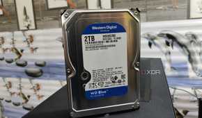 A WD Blue HDD resting on top of a PC
