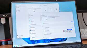 A Windows 11 laptop showing the Focus sessions screen and FancyZones in PowerToys