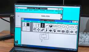 A Windows 11 laptop running Windows 2.0 in a virtual machine