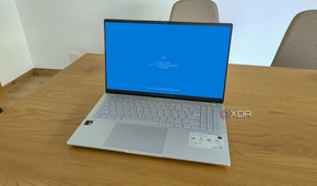 A laptop displaying a screen while Windows is rebooting to install updates