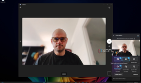 Screenshot of Windows 11 desktop previewing Windows Studio effects in Quick settings, with Portrait light, Portrait blur, and a Illustrated filter applied