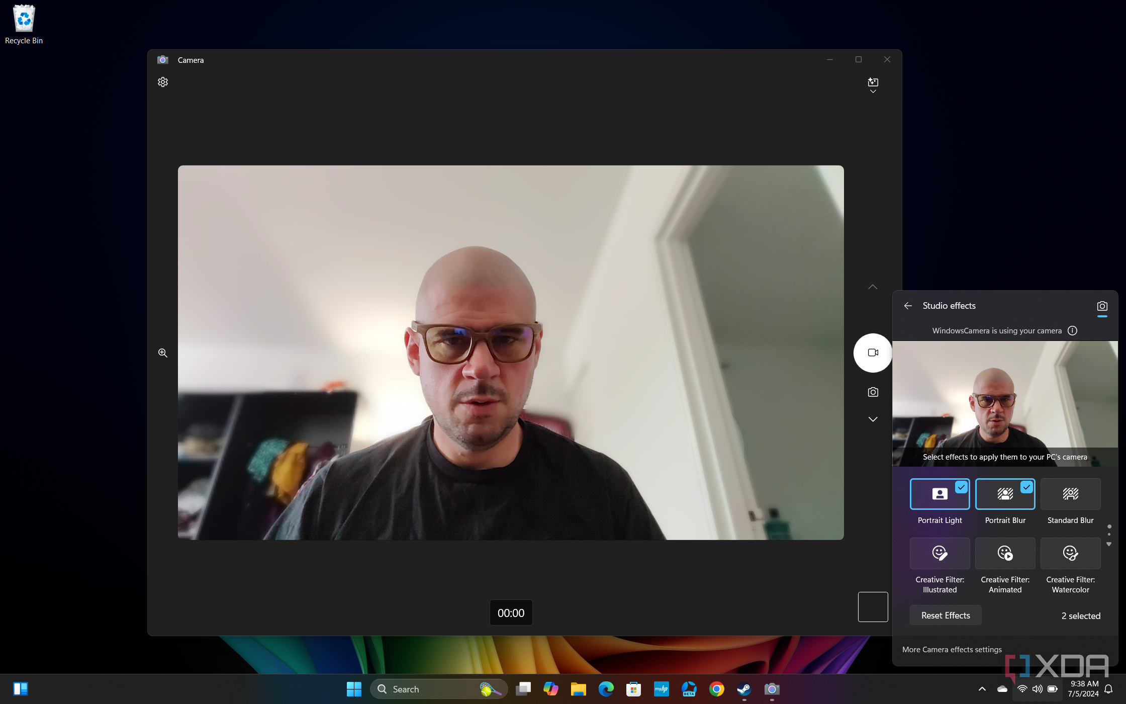 Screenshot of Windows 11 desktop previewing Windows Studio effects in Quick settings, with Portrait light and Portrait blur applied
