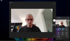 Screenshot of Windows 11 desktop previewing Windows Studio effects in Quick settings, with Portrait light and Portrait blur applied