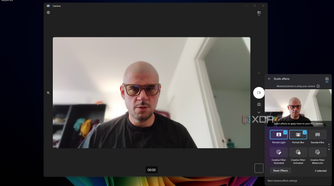 Screenshot of Windows 11 desktop previewing Windows Studio effects in Quick settings, with Portrait light and Portrait blur applied