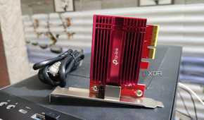 A 10GbE NIC lying on top of a PC case