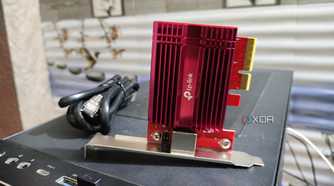 A 10GbE NIC lying on top of a PC case