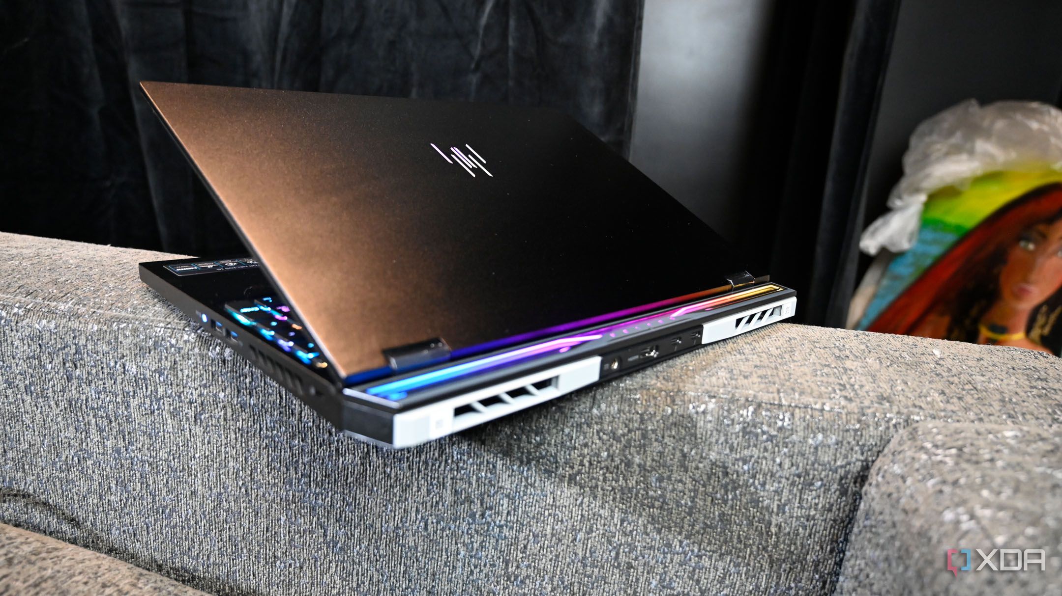 Rear shot of light up Acer Predator Helios 16 (2024) with replacement vent covers