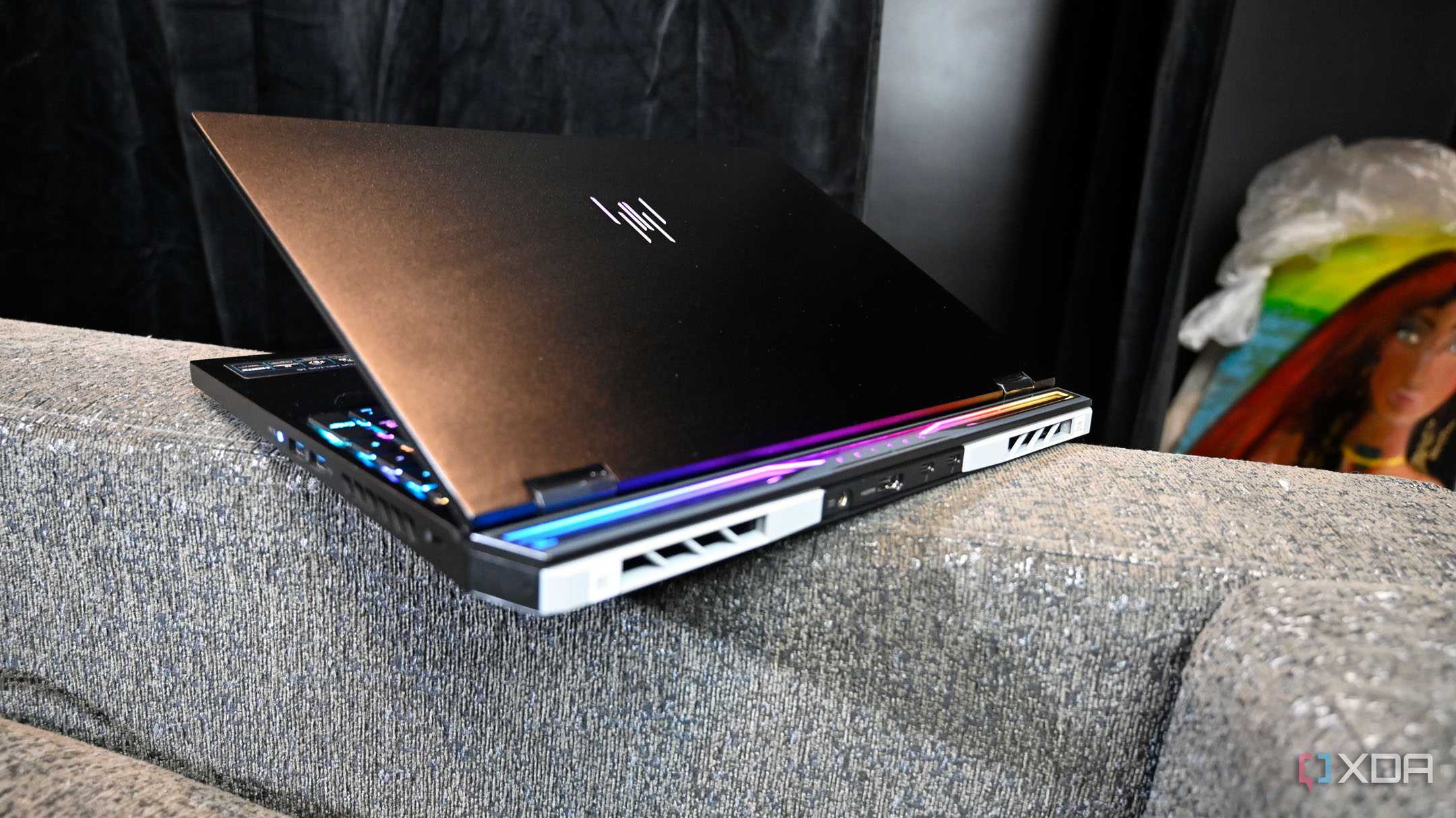 Rear shot of light up Acer Predator Helios 16 (2024) with replacement vent covers