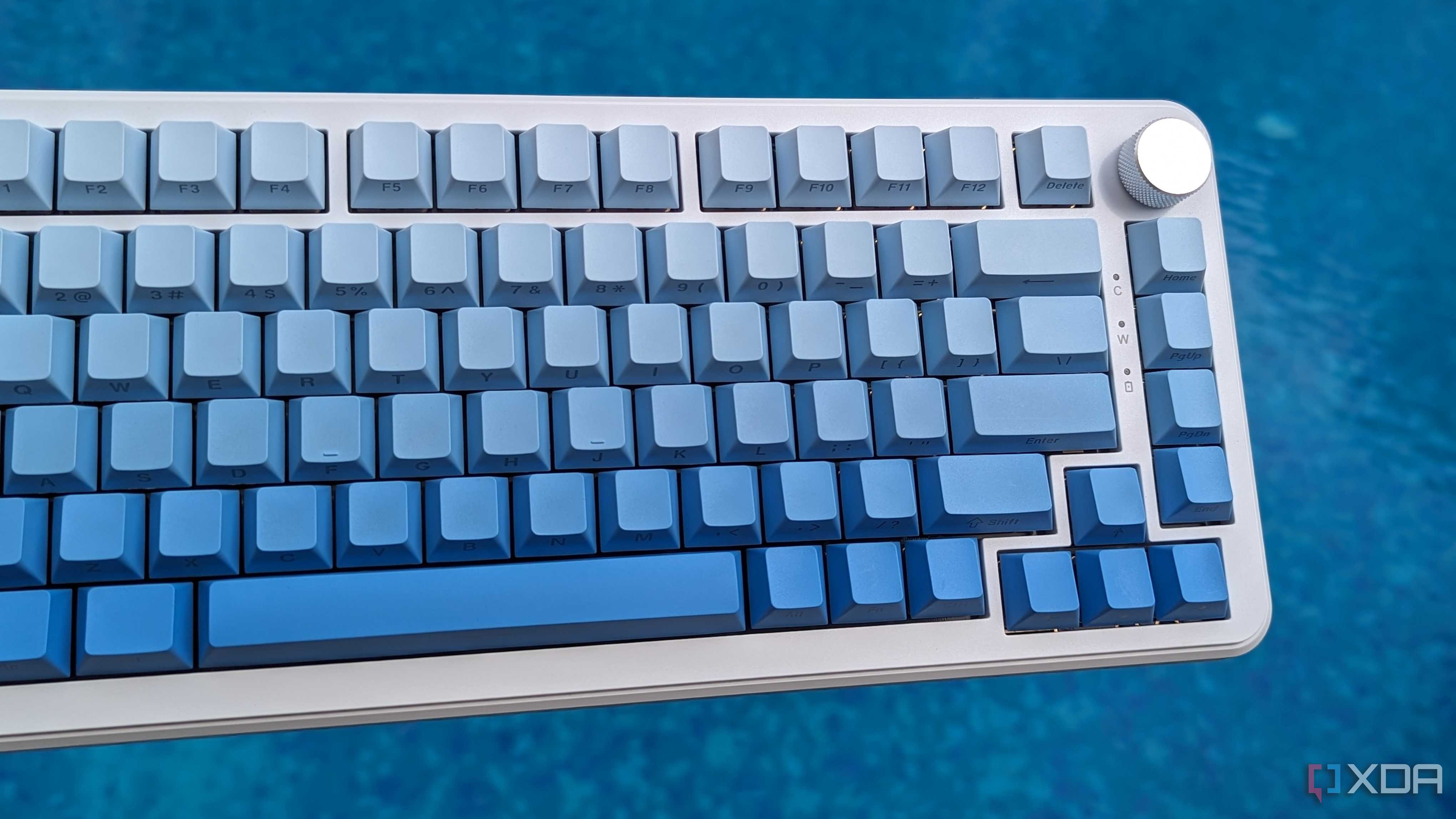 A blue-white keyboard against a blue background
