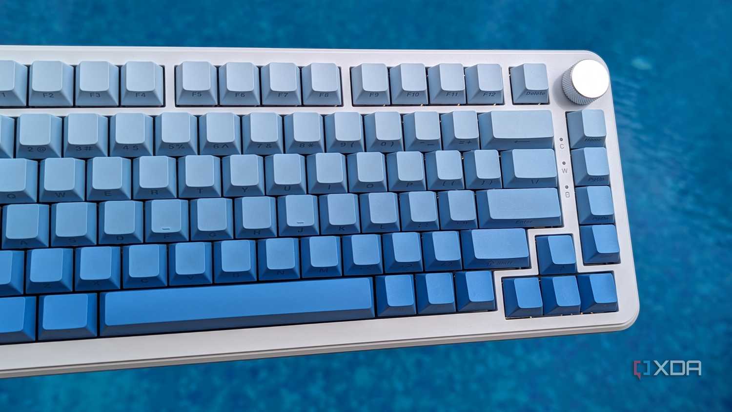 A blue-white keyboard against a blue background