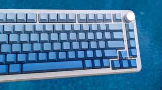 A blue-white keyboard against a blue background