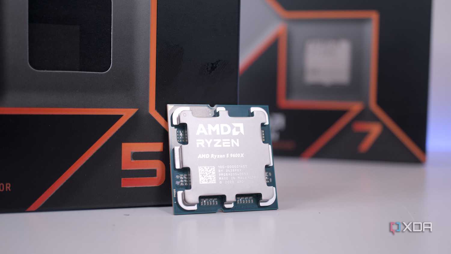 AMD Ryzen 5 9600X infront of the Ryzen 7 box