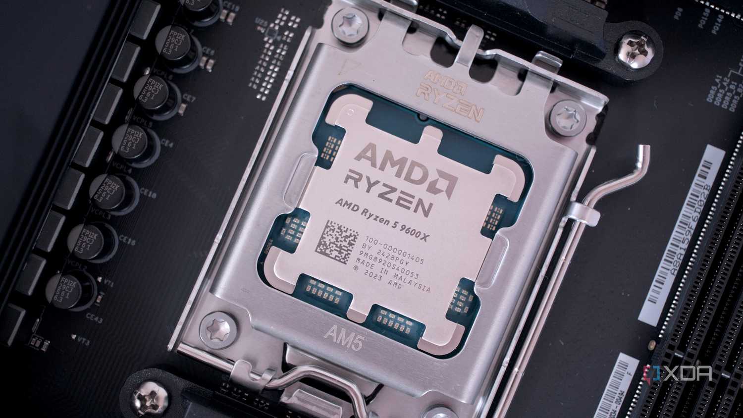 An image of the AMD Ryzen 5 9600X installed on a motherboard.