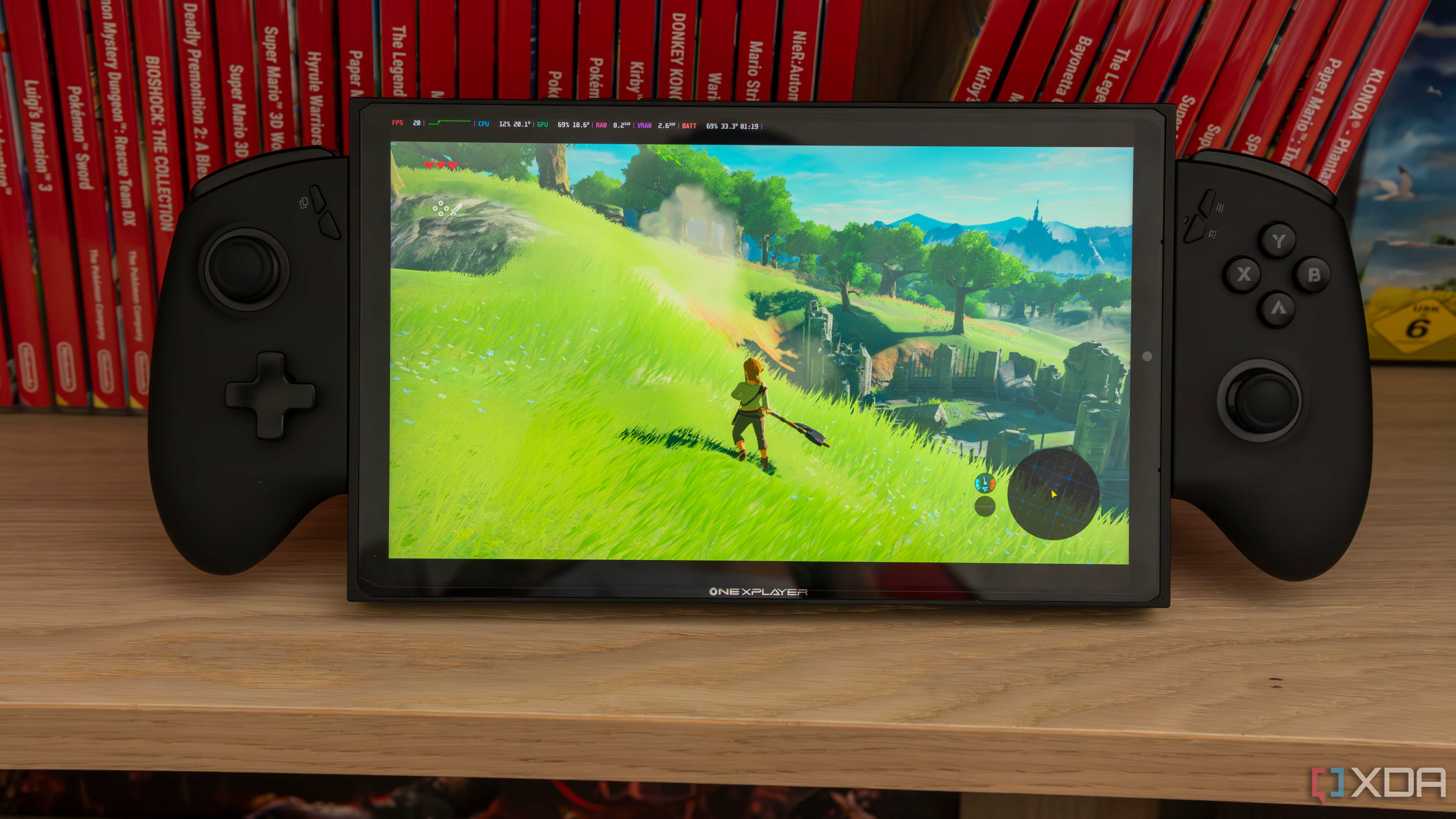 A ONEXPLAYER X1 Mini gaming handheld running The Legend of Zelda Breath of the Wild in an emulator running on Bazzite