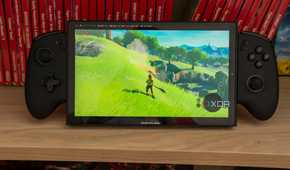 A ONEXPLAYER X1 Mini gaming handheld running The Legend of Zelda Breath of the Wild in an emulator running on Bazzite
